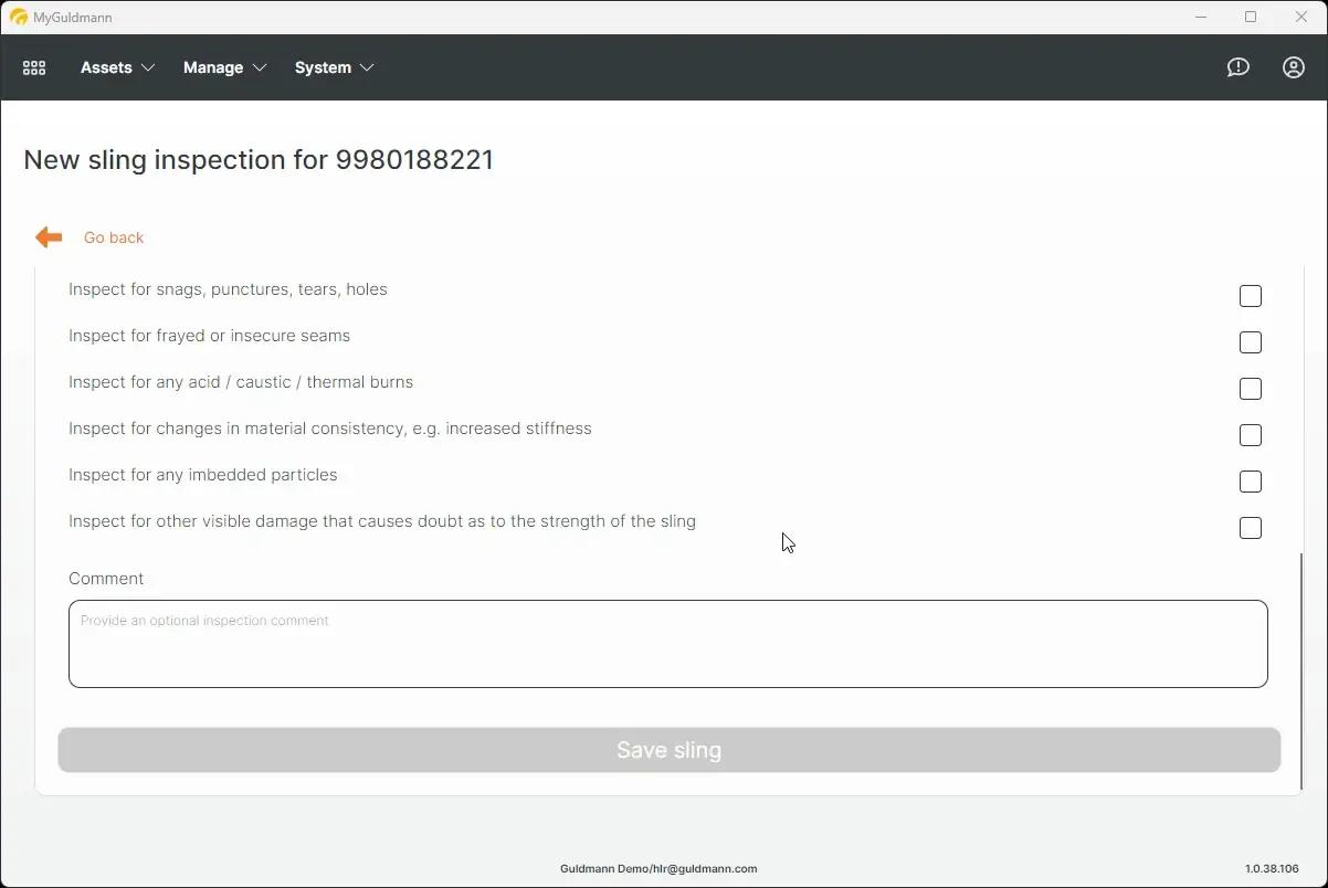 The screenshot shows a new sling inspection form for a Guldmann product, allowing users to check for various types of damage and add comments before saving the inspection.
